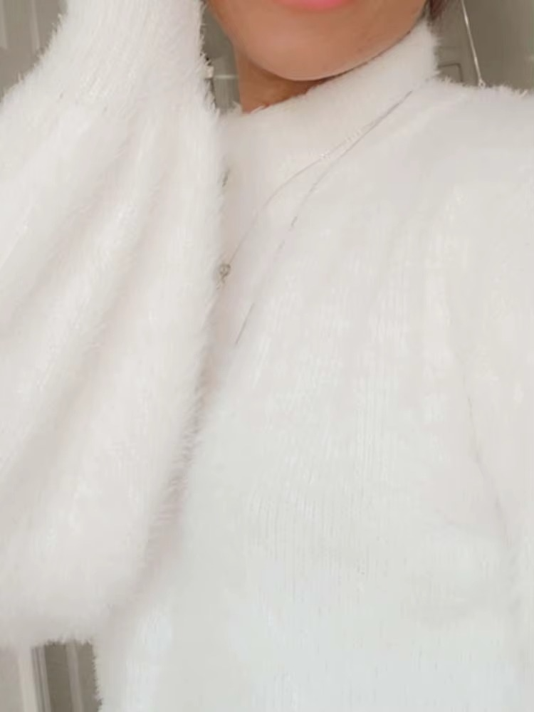 Pull femme doublé en peluche à col roulé