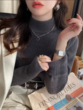 Pull femme d’hiver à col roulé avec doublure en velours