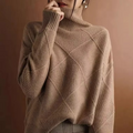 Pull femme en laine à col roulé