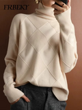 Pull femme en laine à col roulé