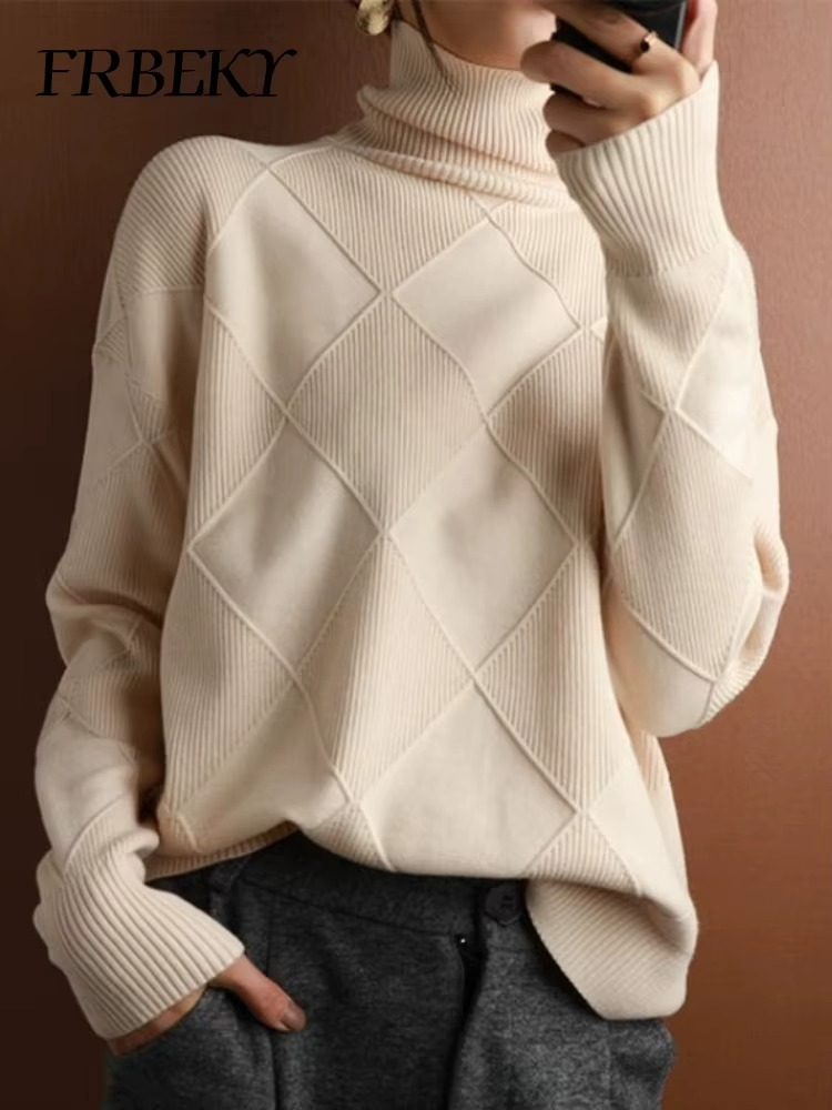 Pull femme en laine à col roulé