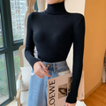 Pull femme en maille à col roulé