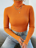 Pull femme en maille à col roulé