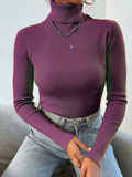 Pull femme en maille à col roulé
