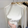 Pull femme en maille avec volants