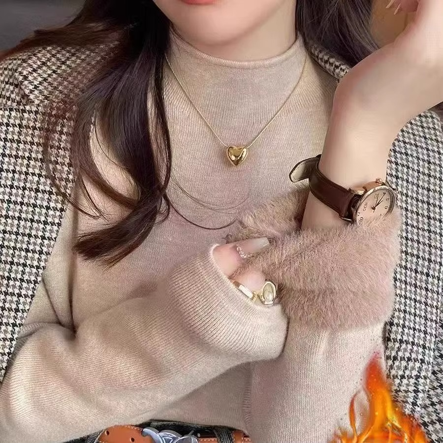 Pull femme en tricot doublé à col roulé d’hiver