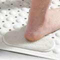 Tapis de bain antidérapant avec surface de massage pour les pieds