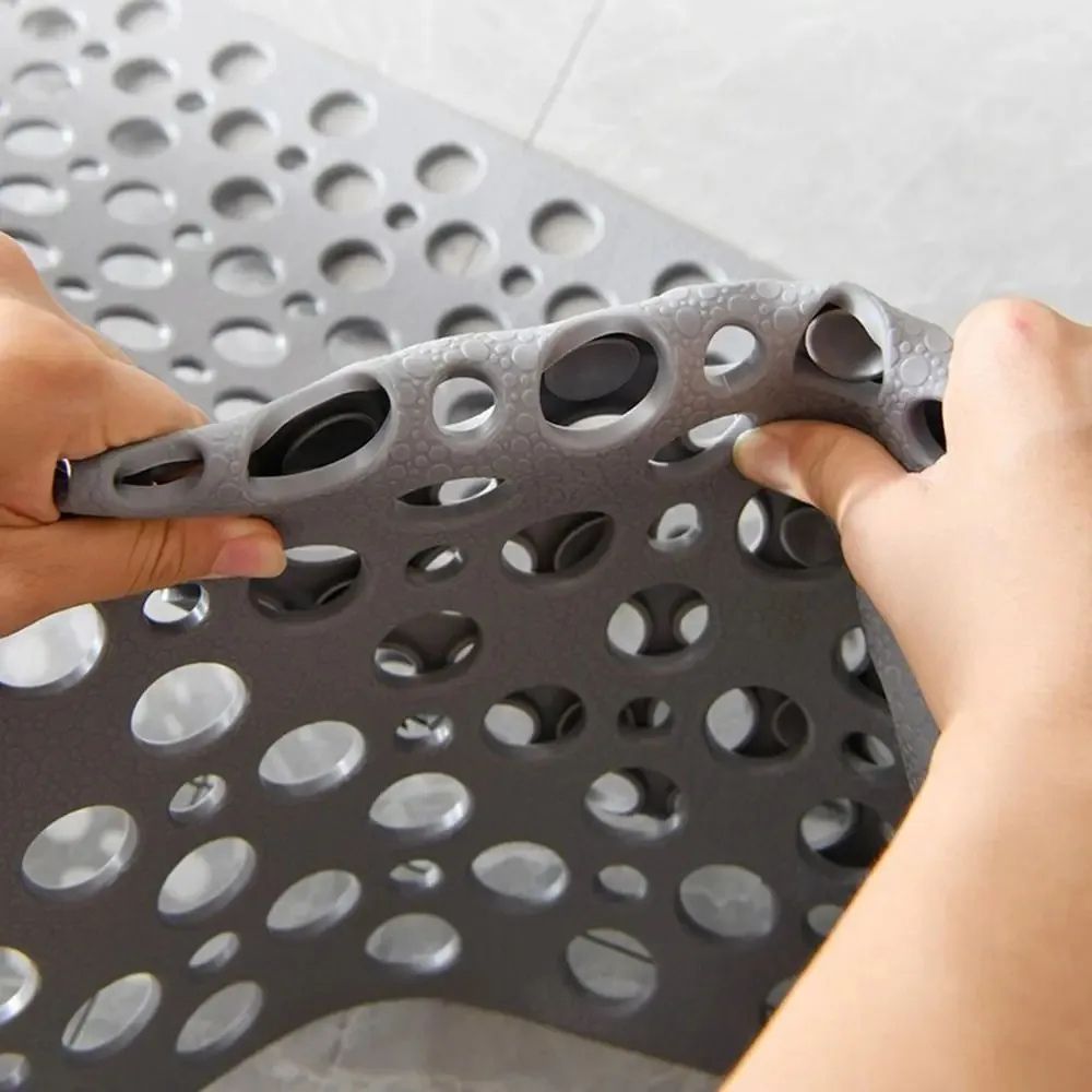 Tapis de bain antidérapant avec trous de drainage et ventouses
