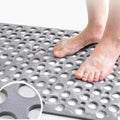 Tapis de bain antidérapant avec trous de drainage et ventouses
